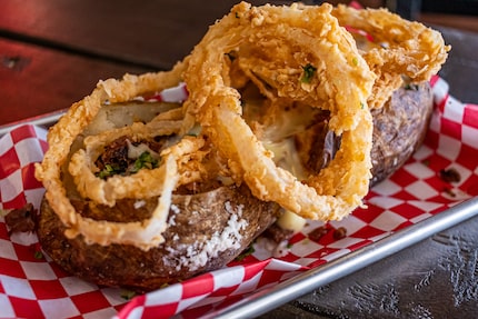 Moak's Family Texas BBQ sells three loaded baked potatoes. Here's the H'Angry Baker, a tater...