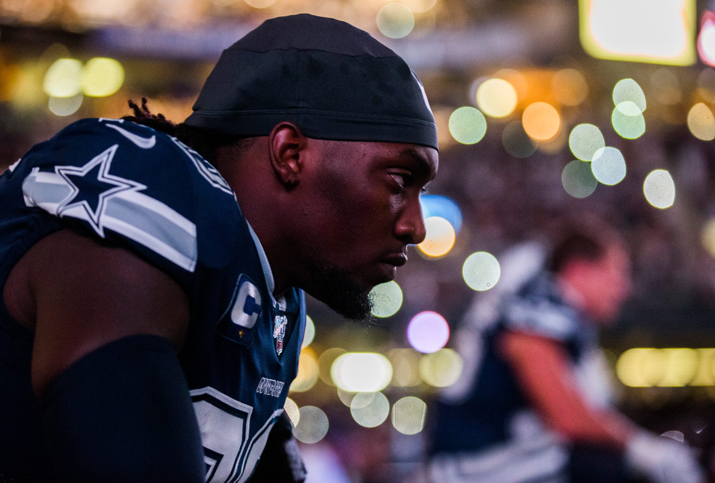 Dallas Cowboys defensive end Demarcus Lawrence (90) sits on the bench before an NFL game...