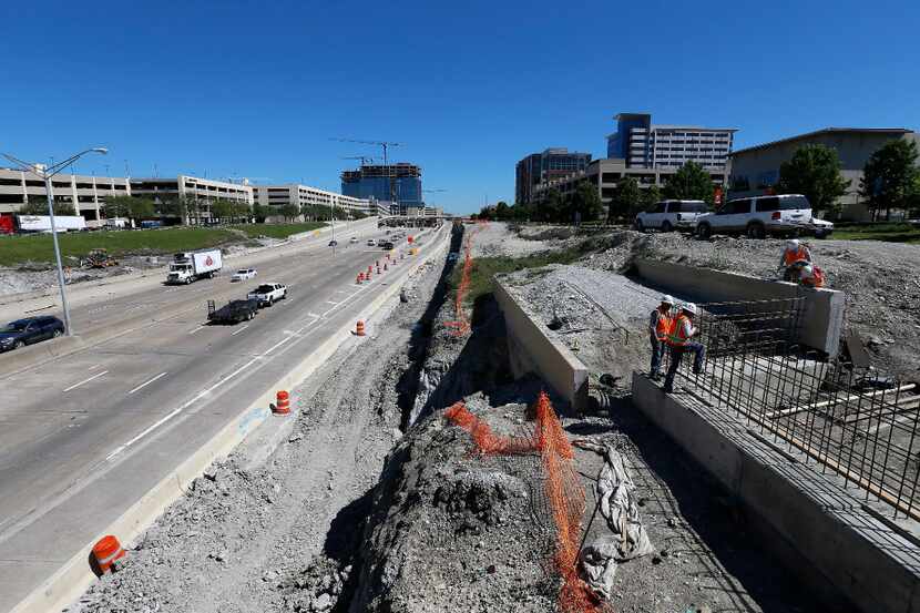 Road construction was underway in May along Dallas North Tollway  near Tennyson Parkway with...