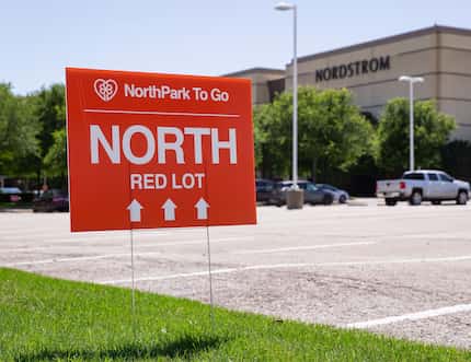NorthPark To Go red lot is on the Park Lane side. 