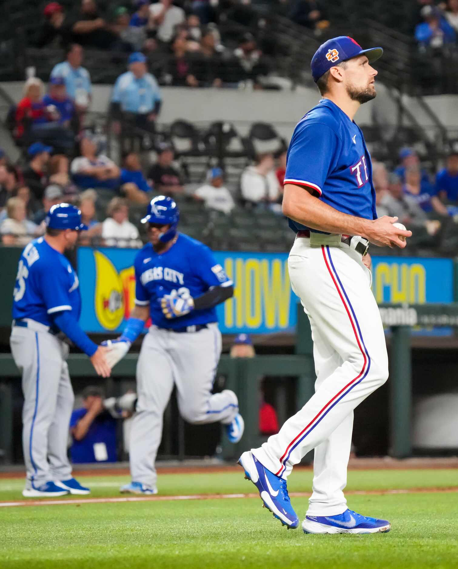 Texas Rangers starting pitcher Nathan Eovaldi (17) gets a new ball after a home run by...