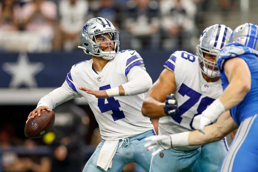 1Dallas Cowboys quarterback Dak Prescott (4) throws a pass during the first half of a NFL...