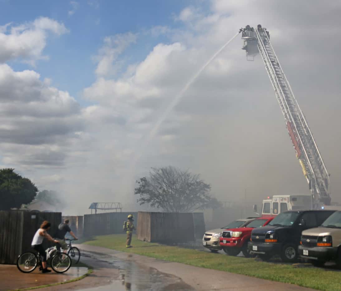 Firefighters battle a blaze at the Appleseed Academy in Mesquite. 