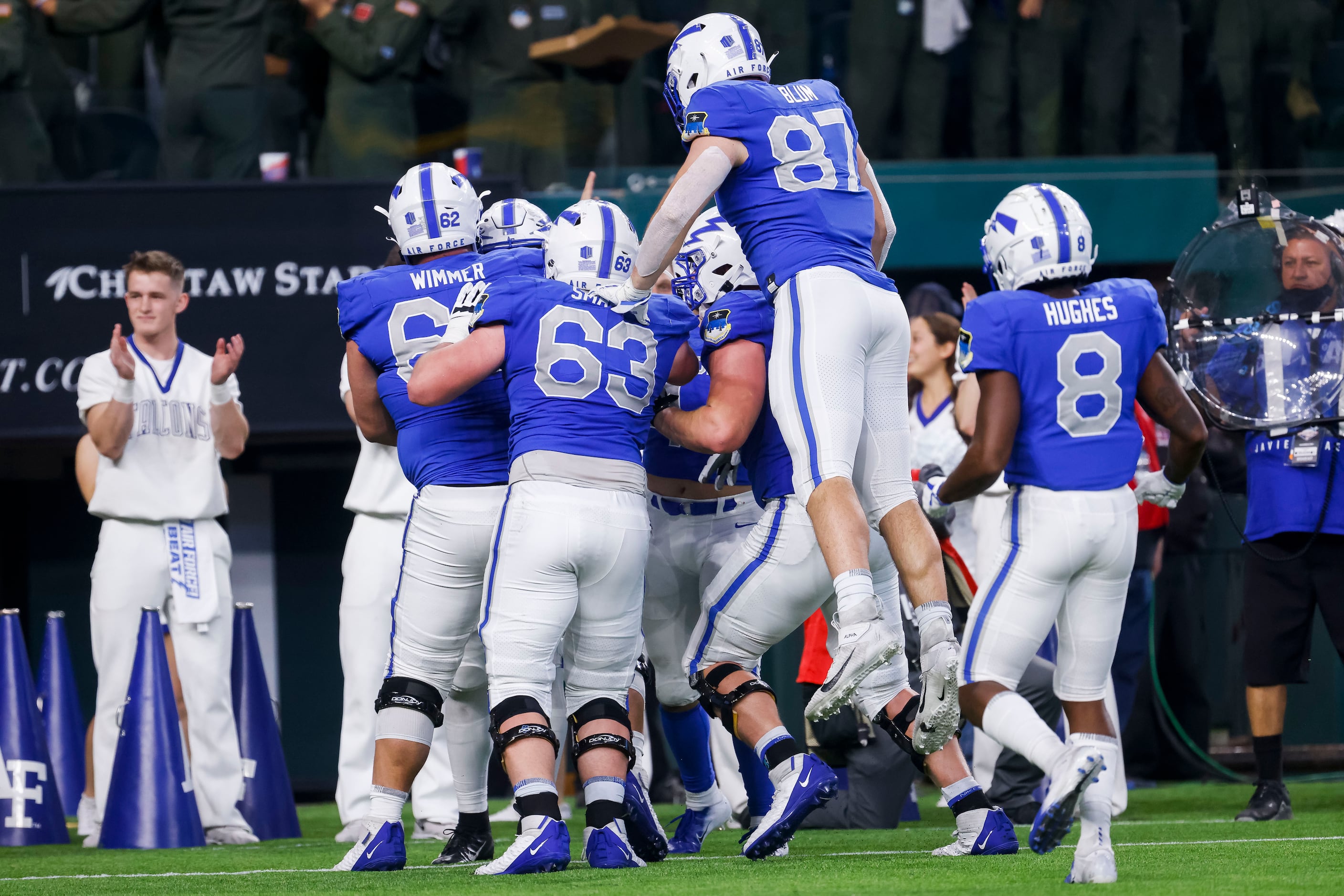 Air Force Falcons celebrate safety Dane Kinamon (23) touchdown against the Army Black...