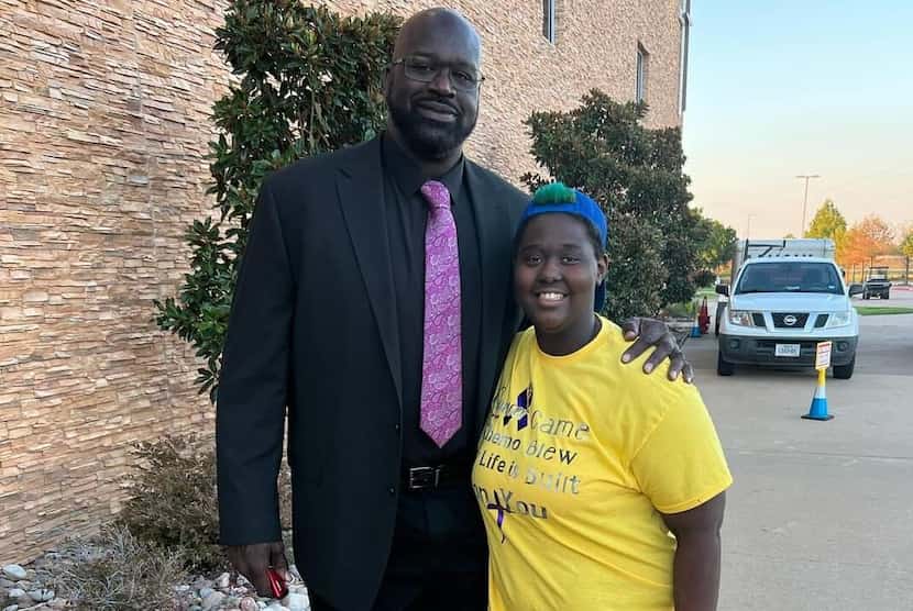 Shaquille O'Neal met Mansfield resident Faith Watts at the Allies in Youth Development...