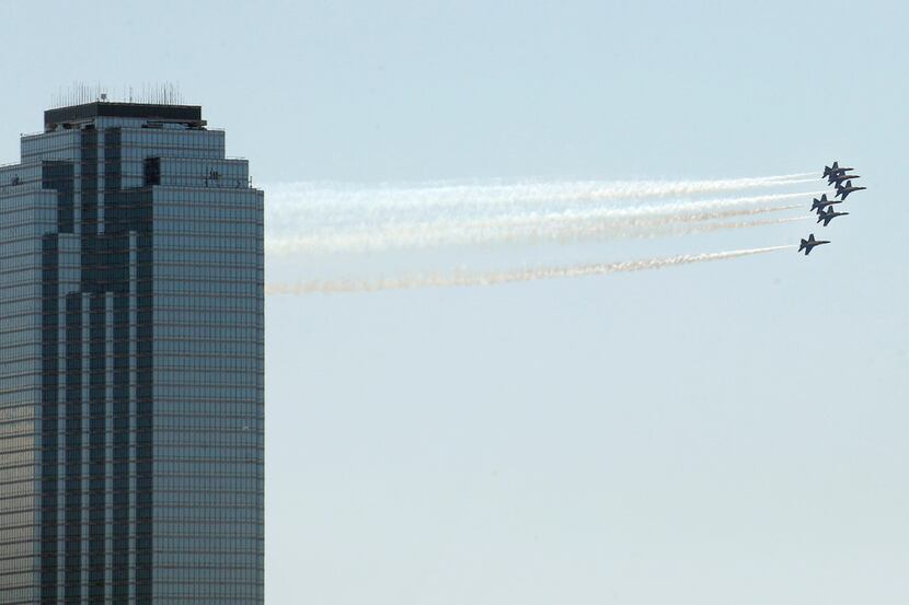Jets fly past the Bank of America building in downtown Dallas in 2020.