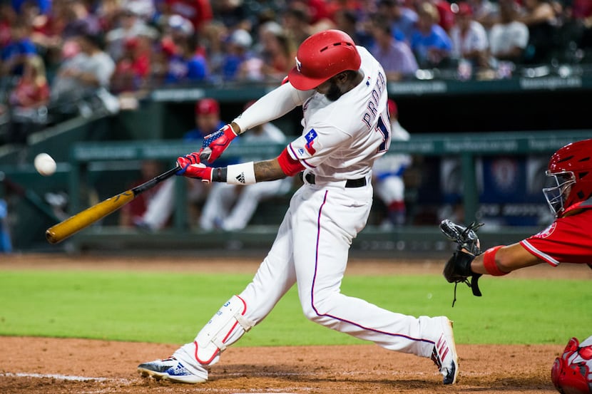 Texas Rangers shortstop Jurickson Profar (19) hits a home run during the sixth inning of an...