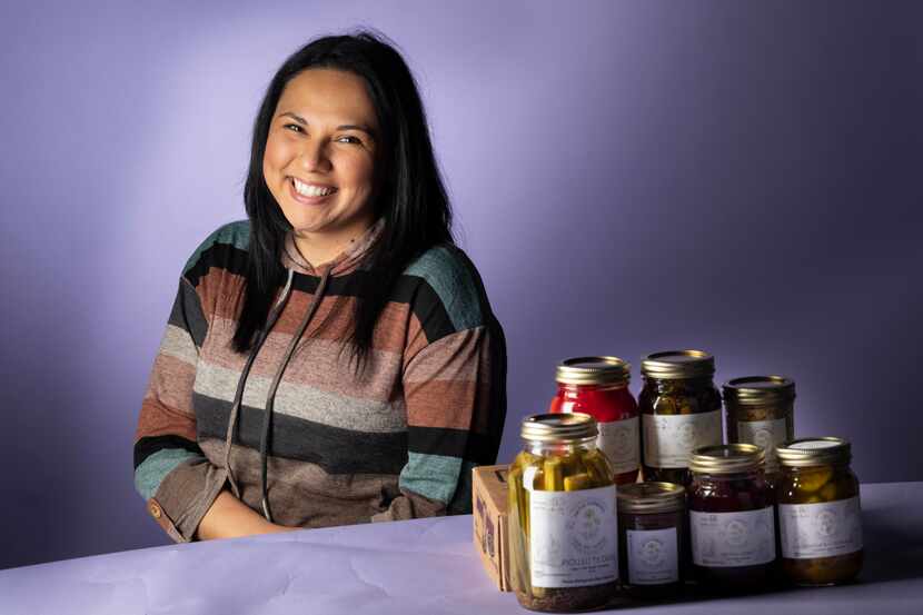 Jessica Alonzo of Dallas, a chef who just launched her own fermentation business, poses with...