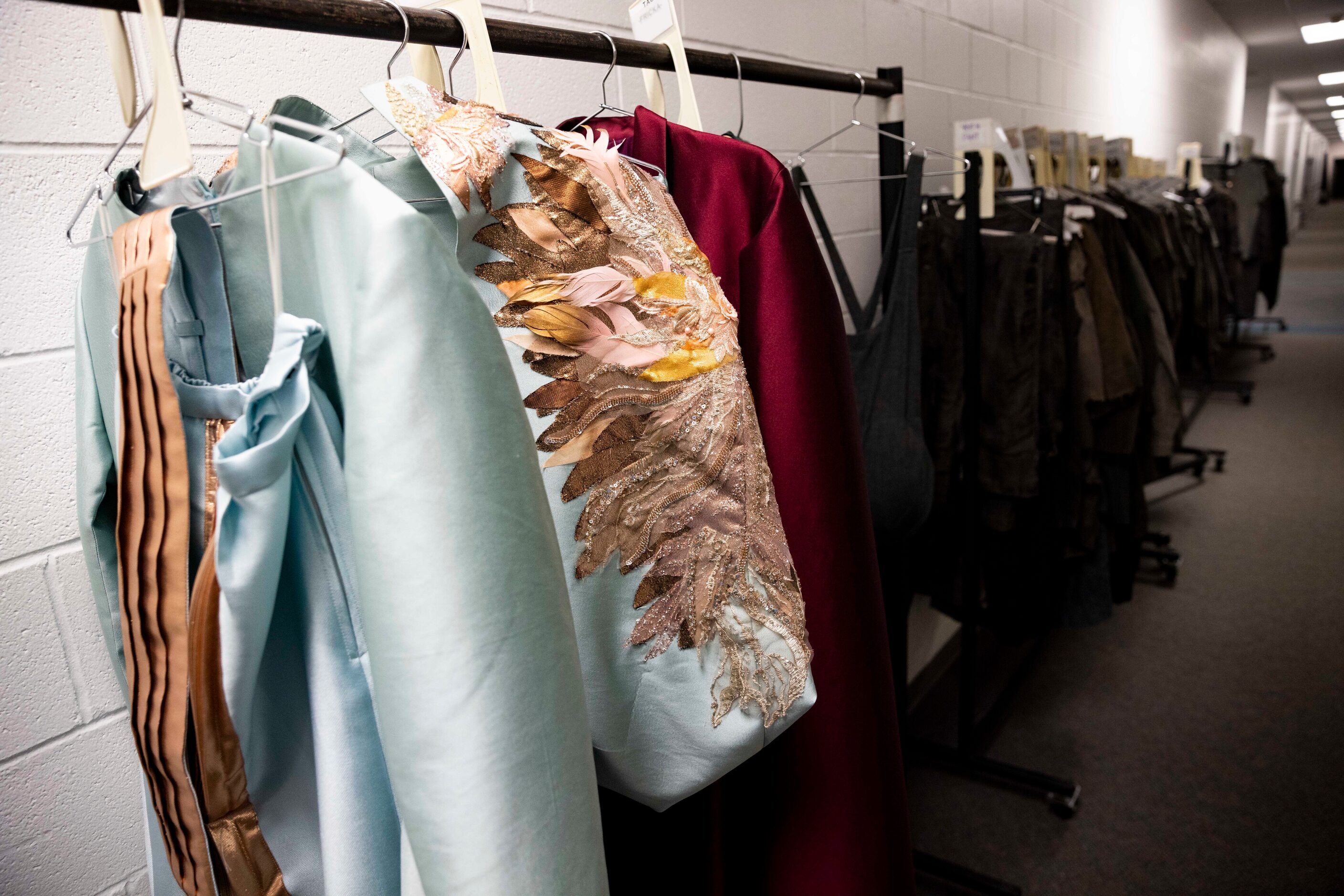 Costumes sit on racks for Dallas Opera’s Das Rheingold on Wednesday, Jan. 18, 2023, at...