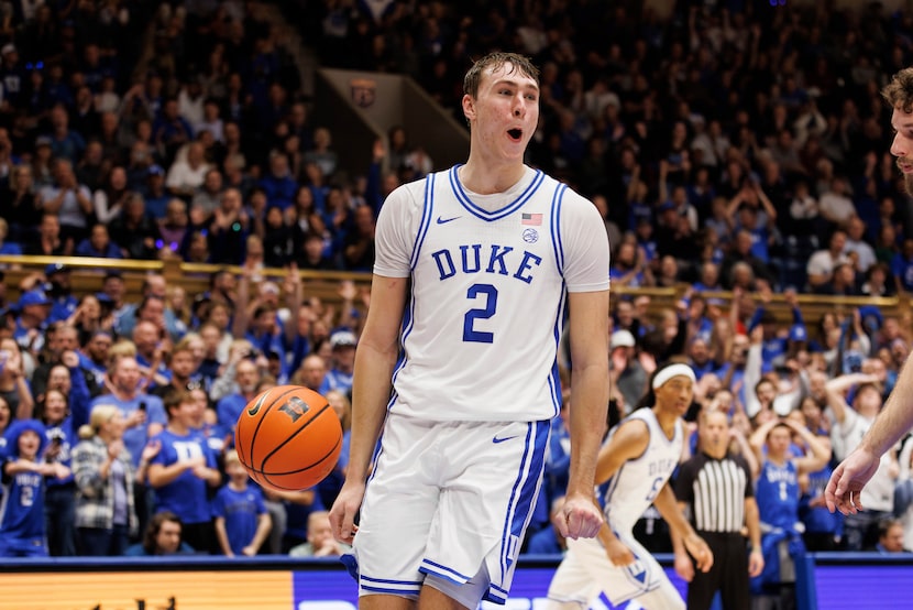 Duke's Cooper Flagg (2) reacts after a dunk during the second half of an NCAA college...