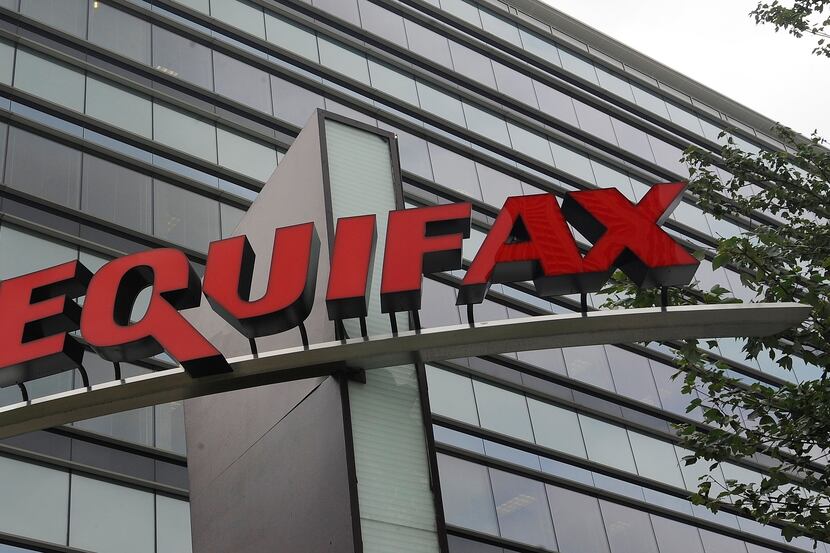 FILE- This July 21, 2012, file photo shows signage at the corporate headquarters of Equifax...