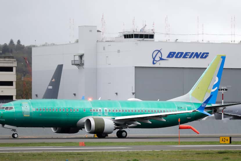 In this April 10, 2019, file photo a Boeing 737 Max 8 airplane rolls toward takeoff before a...