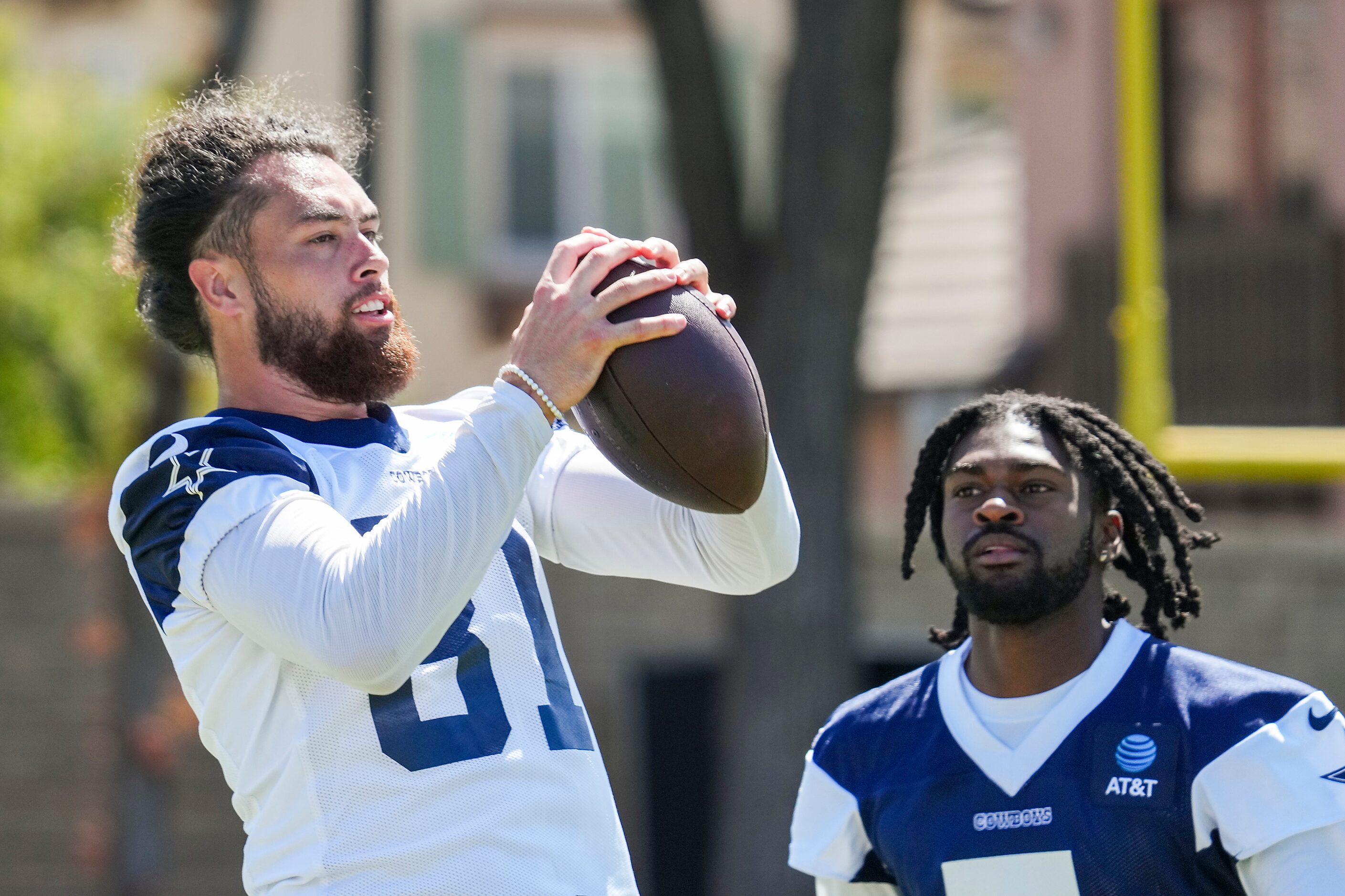 Dallas Cowboys wide receiver Simi Fehoko (81) makes a catch next to cornerback Trevon Diggs...