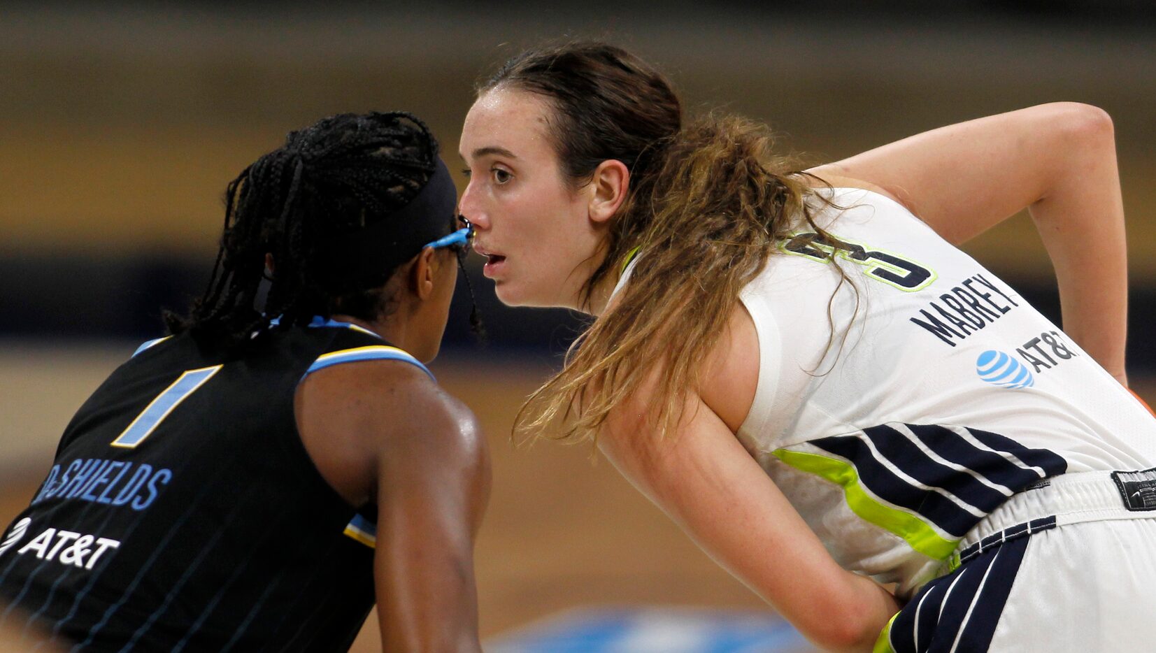 Dallas Wings guard Marina Mabrey (3), right, keeps the ball from Chicago Sky guard Diamond...