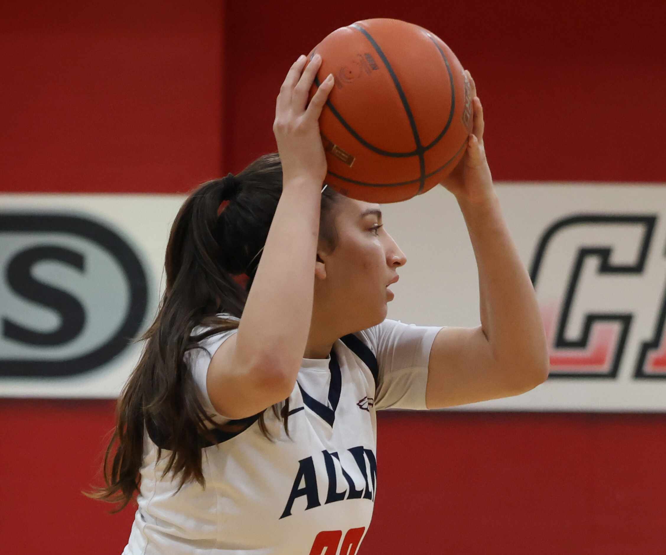 Allen's Audrey Cline (32) looks to pass during second half action against Highland Park....