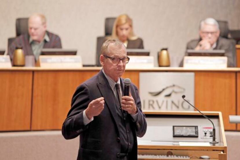 
Paul Buss, president of OliverMcMillan, addressed Irving residents Monday night during a...