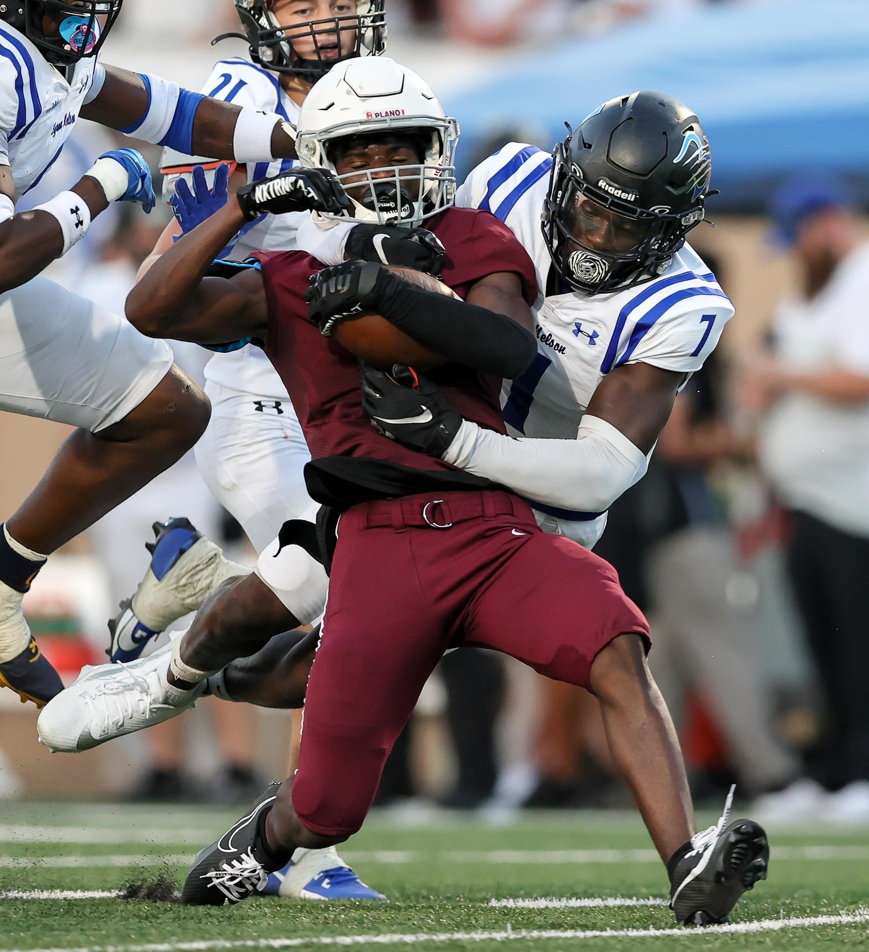 Plano wide receiver DJ Hamilton comes up with a reception against Byron Nelson linebacker...