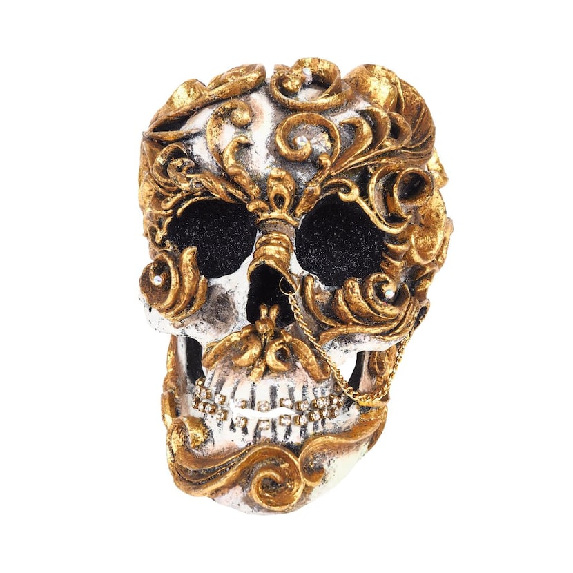 
Lose your head: Golden scrolls accented with rhinestones encircle the twin black eyes of...