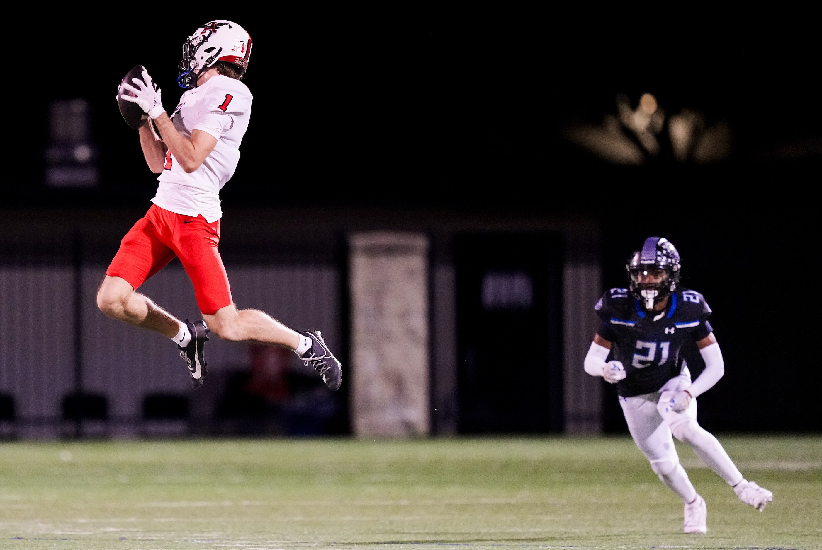 Argyle wide receiver Will Krzysiak (1) leaps for a reception as Mansfield Summit defensive...