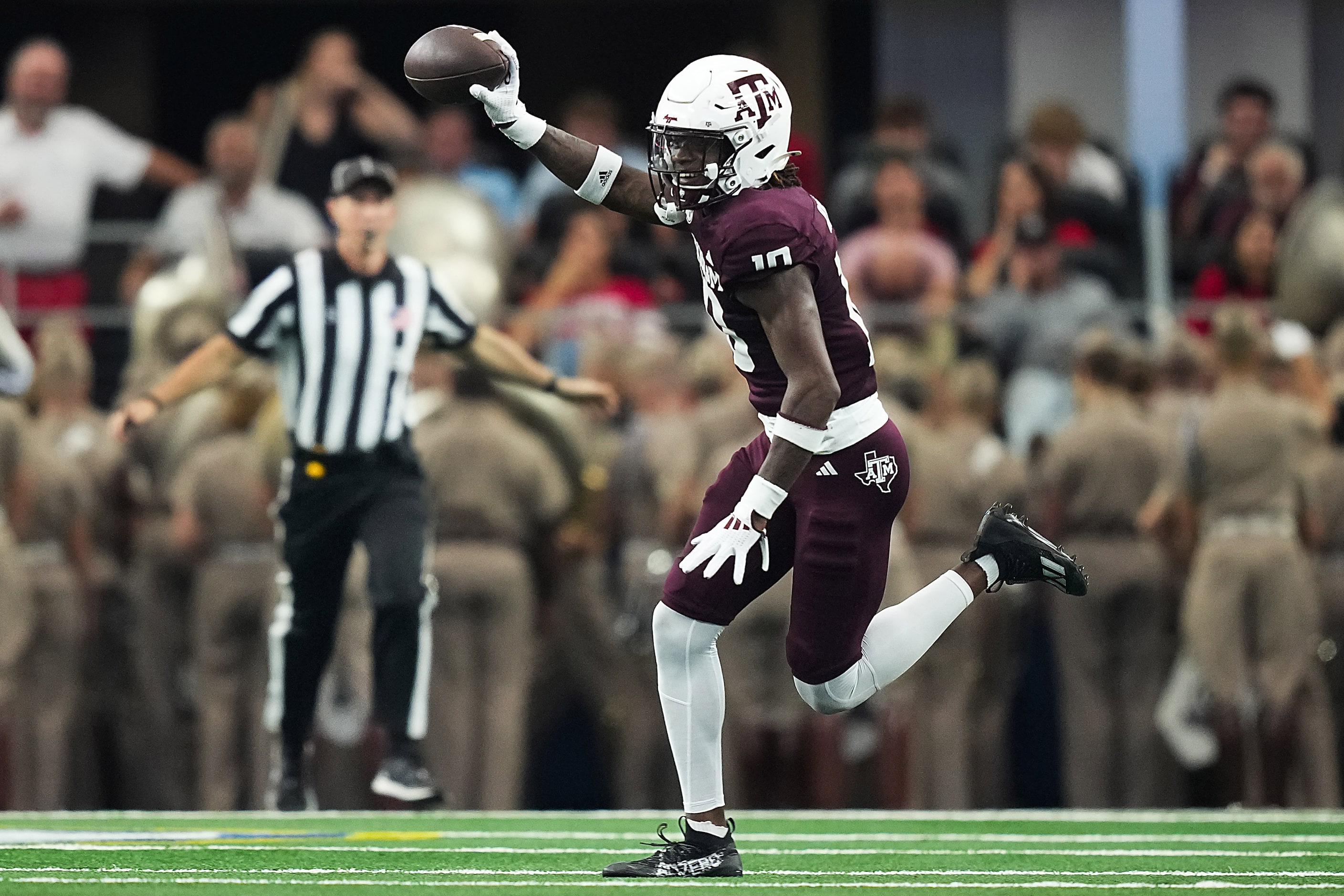 Texas A&M defensive back Dezz Ricks (10) celebrates after intercepting a pass during the...