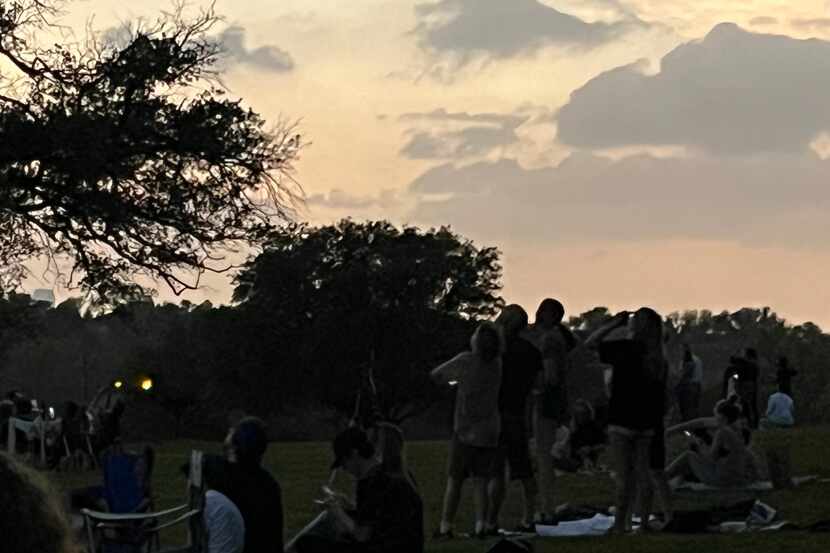 No formal eclipse event was scheduled for Dallas' Flag Pole Hill Park, just north of White...