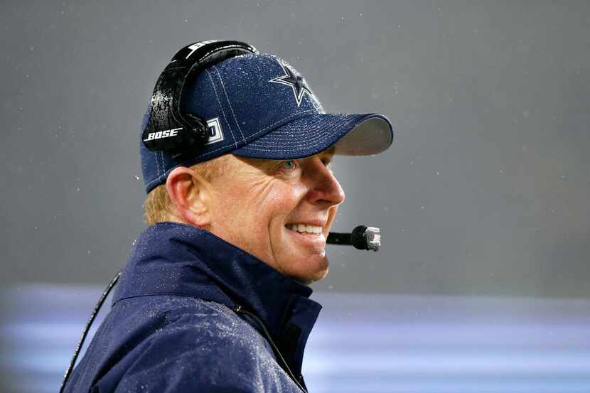 FILE - Then-Cowboys head coach Jason Garrett watches his offense against the New England...