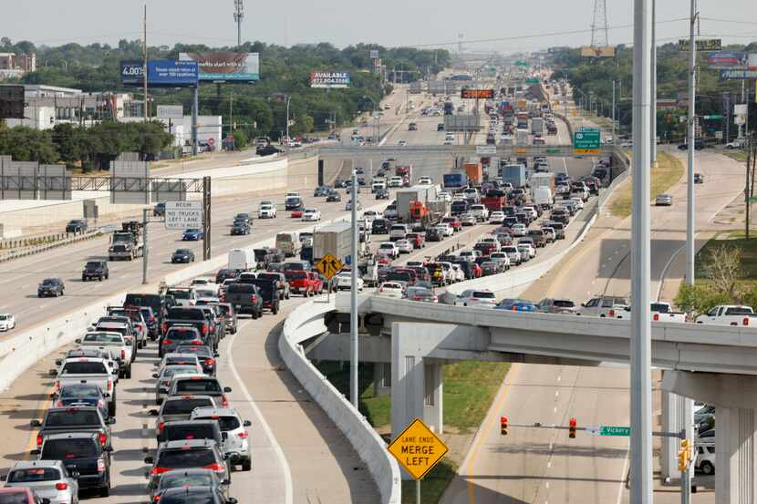 Traffic backs up along southbound Interstate 35W near Interstate 30, Tuesday, July 11, 2023...