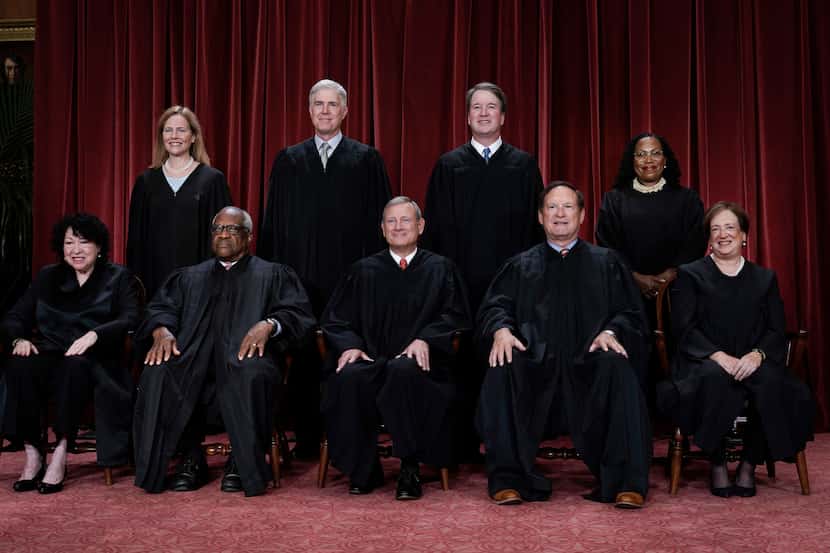 Members of the U.S. Supreme Court sat in October for a new group portrait following the...