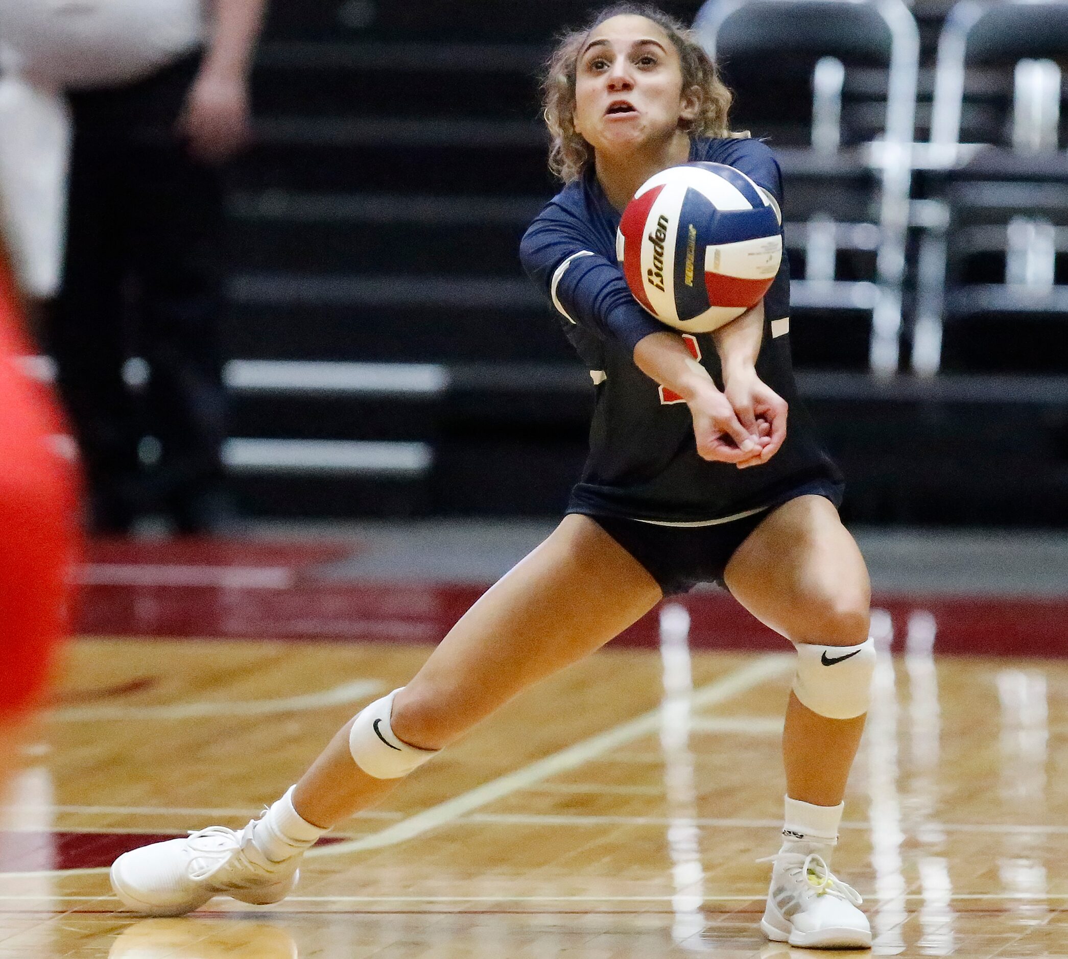 Aubrey High School liber Makayla Johnson (8) receives a serve during game two as Aubrey High...