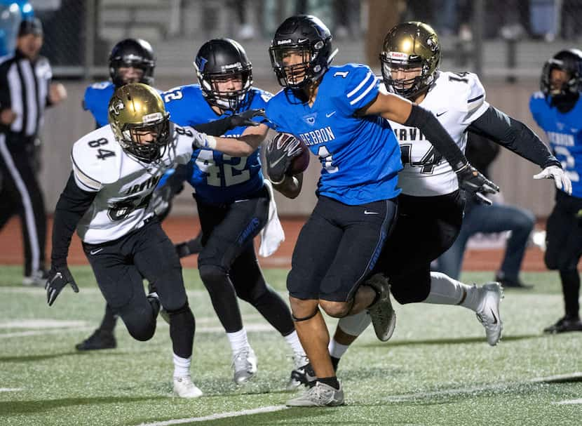 Hebron senior kick returner and Oklahoma commit Trejan Bridges (1) breaks away from the...