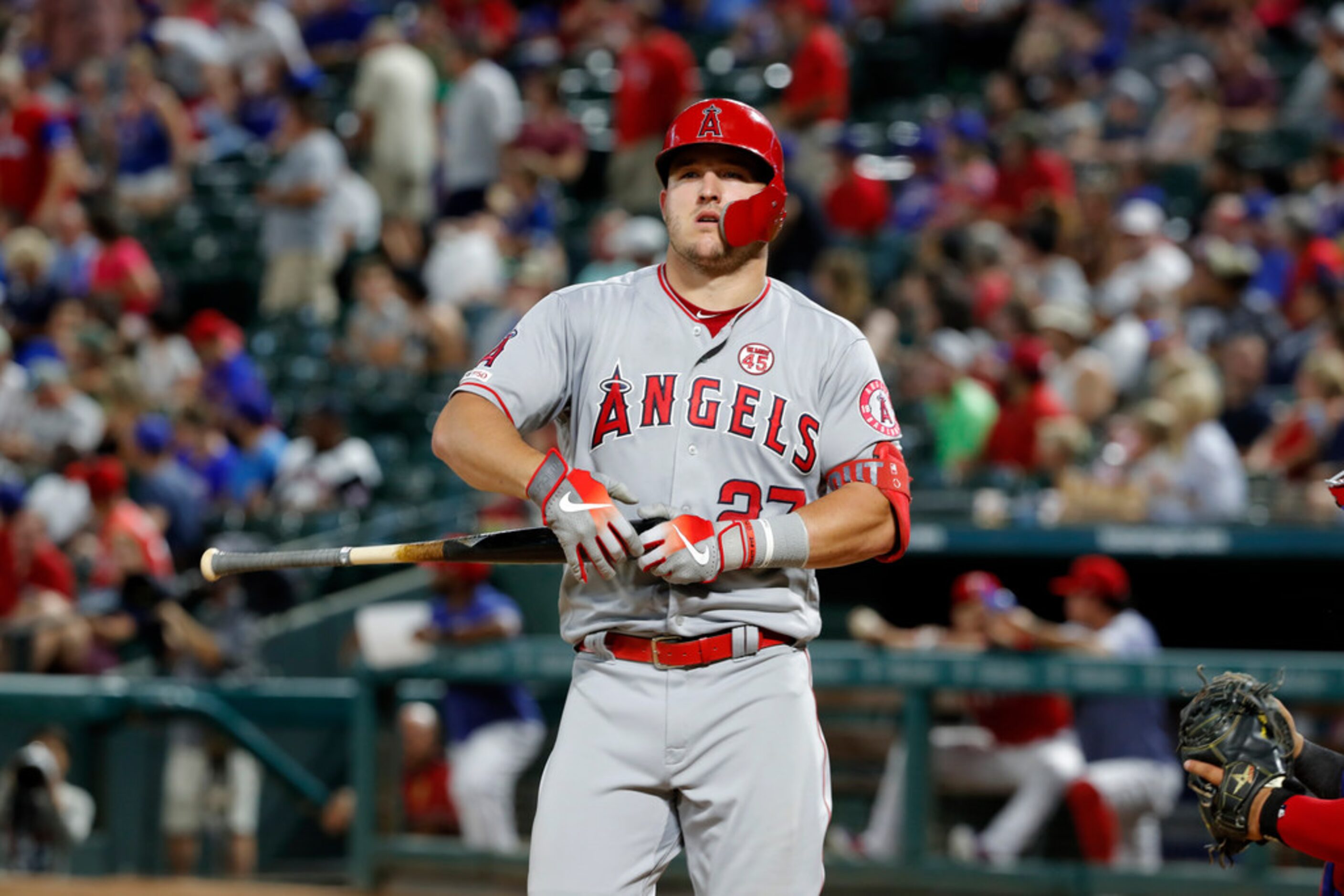 Los Angeles Angels' Mike Trout works an at-bat against the Texas Rangers in the fourth...