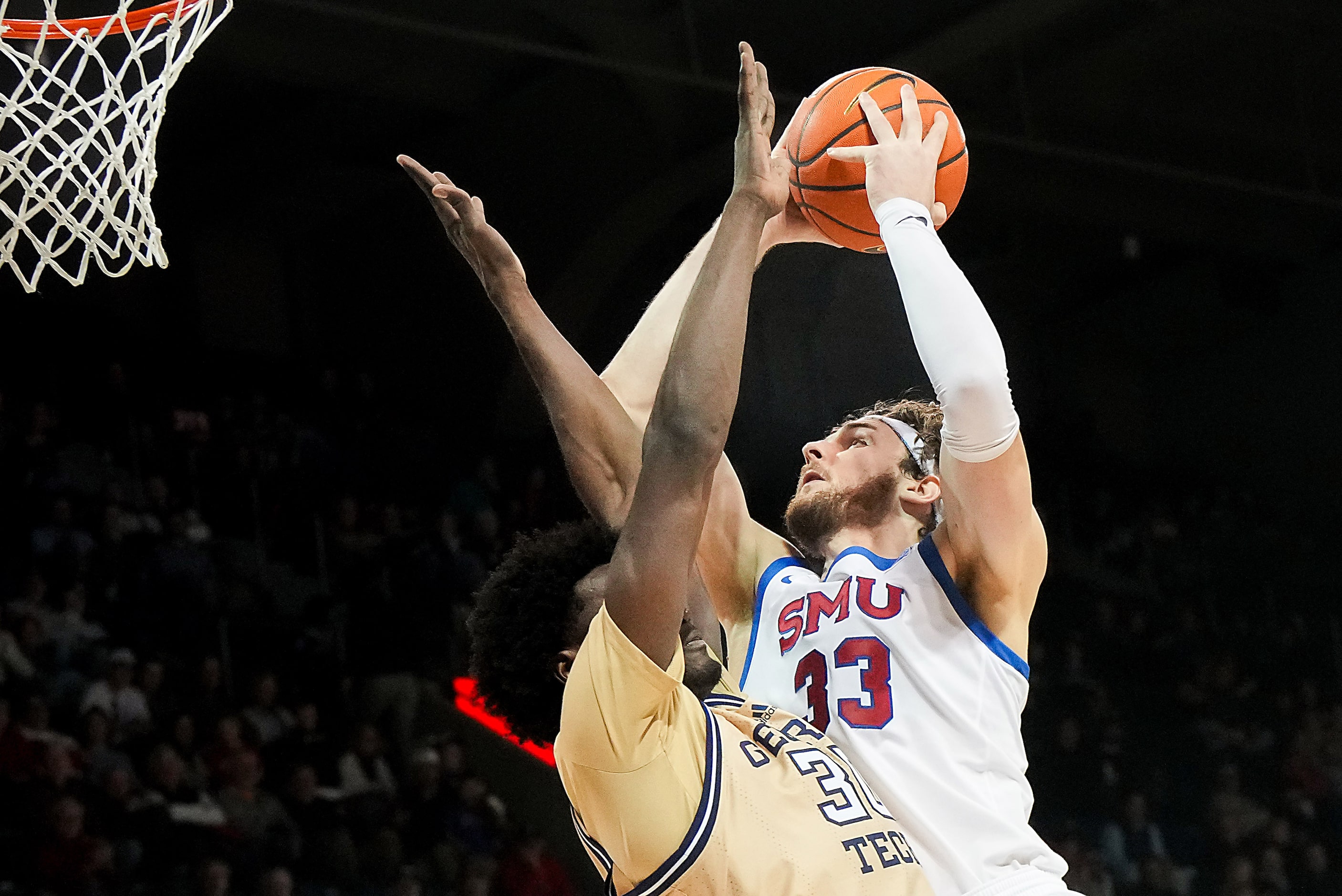 SMU forward Matt Cross (33) drives to the basket against Georgia Tech forward Ibrahim Souare...