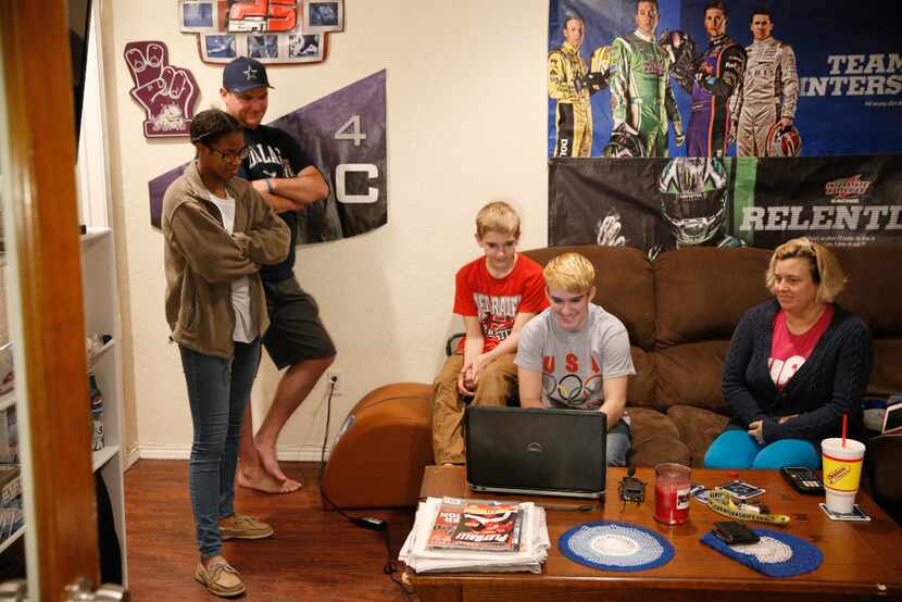 Mack Beggs (in front of computer), state wrestling champion and 17-year-old transgender...