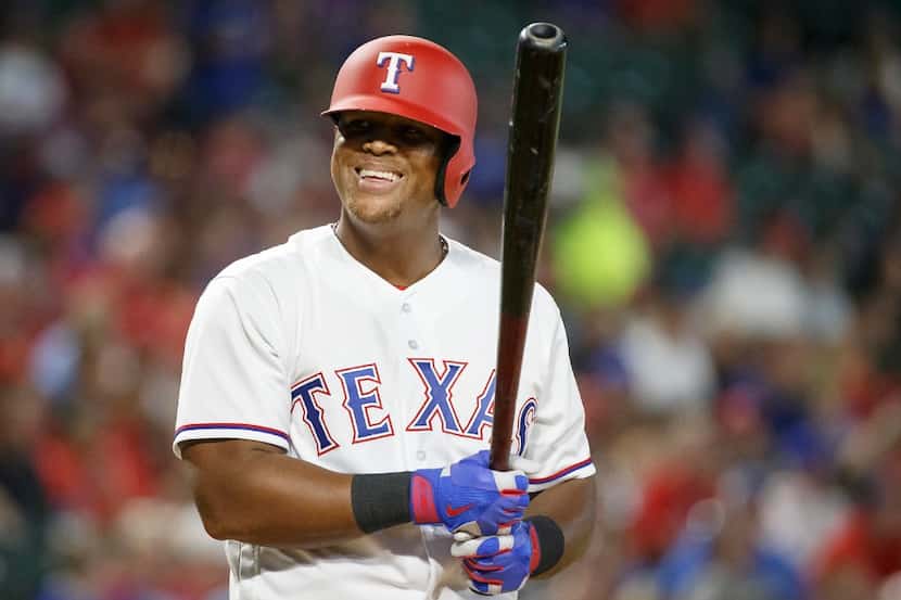Texas Rangers third baseman Adrian Beltre smiles as he steps into the batters box during the...