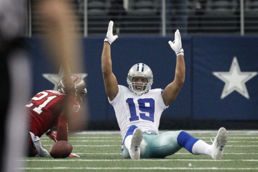 Dallas Cowboys wide receiver Miles Austin (19) reacts after making a long reception against...