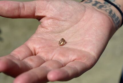 The gem Hollingshead found was about the size of a pencil eraser, with a "sparkling metallic...