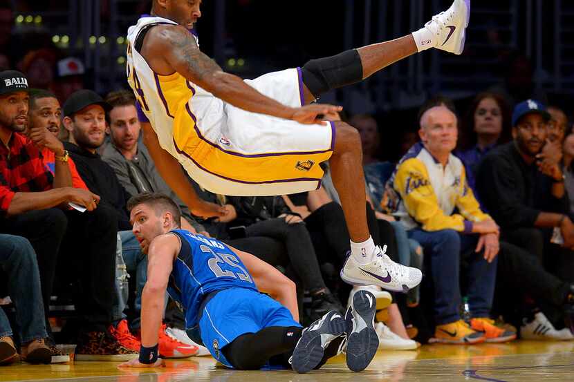 Nov 1, 2015; Los Angeles, CA, USA; Los Angeles Lakers forward Kobe Bryant (24) is fouled by...