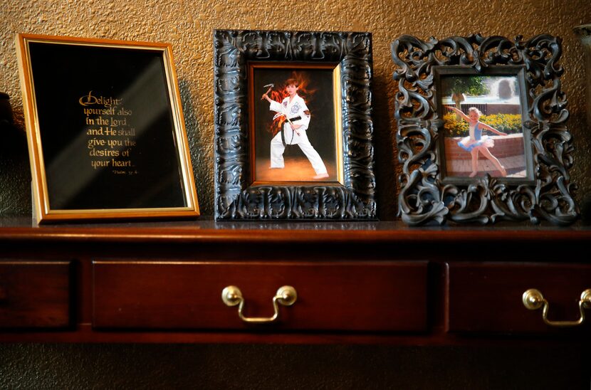 The Speed home is dotted with family photos, included Braden in a 2011 taekwondo photo and...