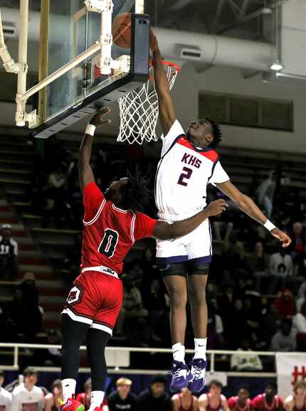 Kimball guard T'Johnn Brown (2) goes up high to block a shot against Woodrow Wilson guard...