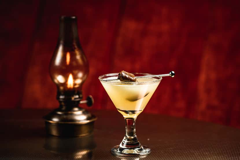 Apothecary bar in Dallas serves the Oyster Rockefeller Shot, which channels the classic dish...