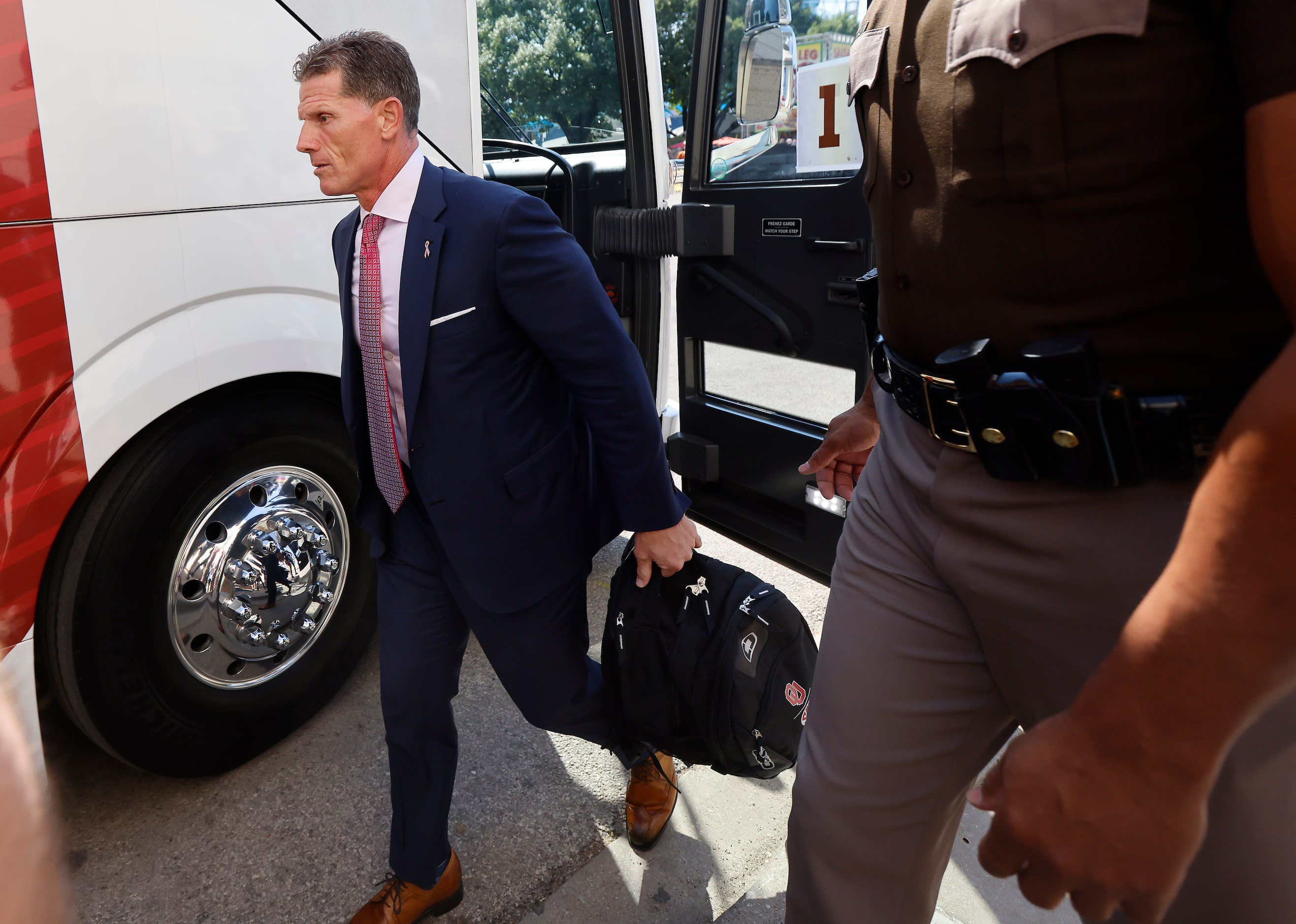 Oklahoma Sooners head coach Brent Venables arrives for the Red River Rivalry outside the...