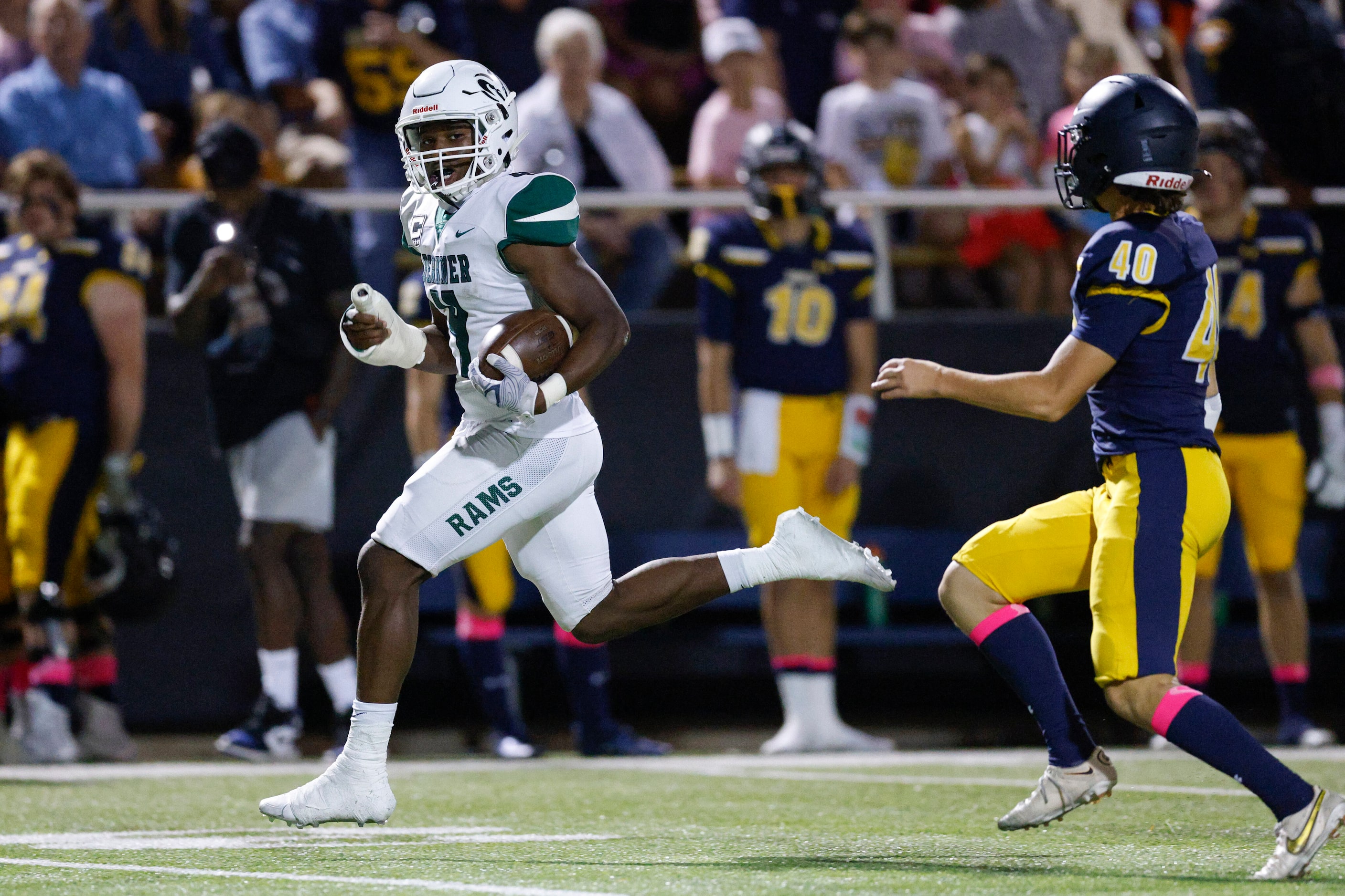 Richardson Berkner running back Jamary Williams (4) looks at Highland Park kicker Nicholas...