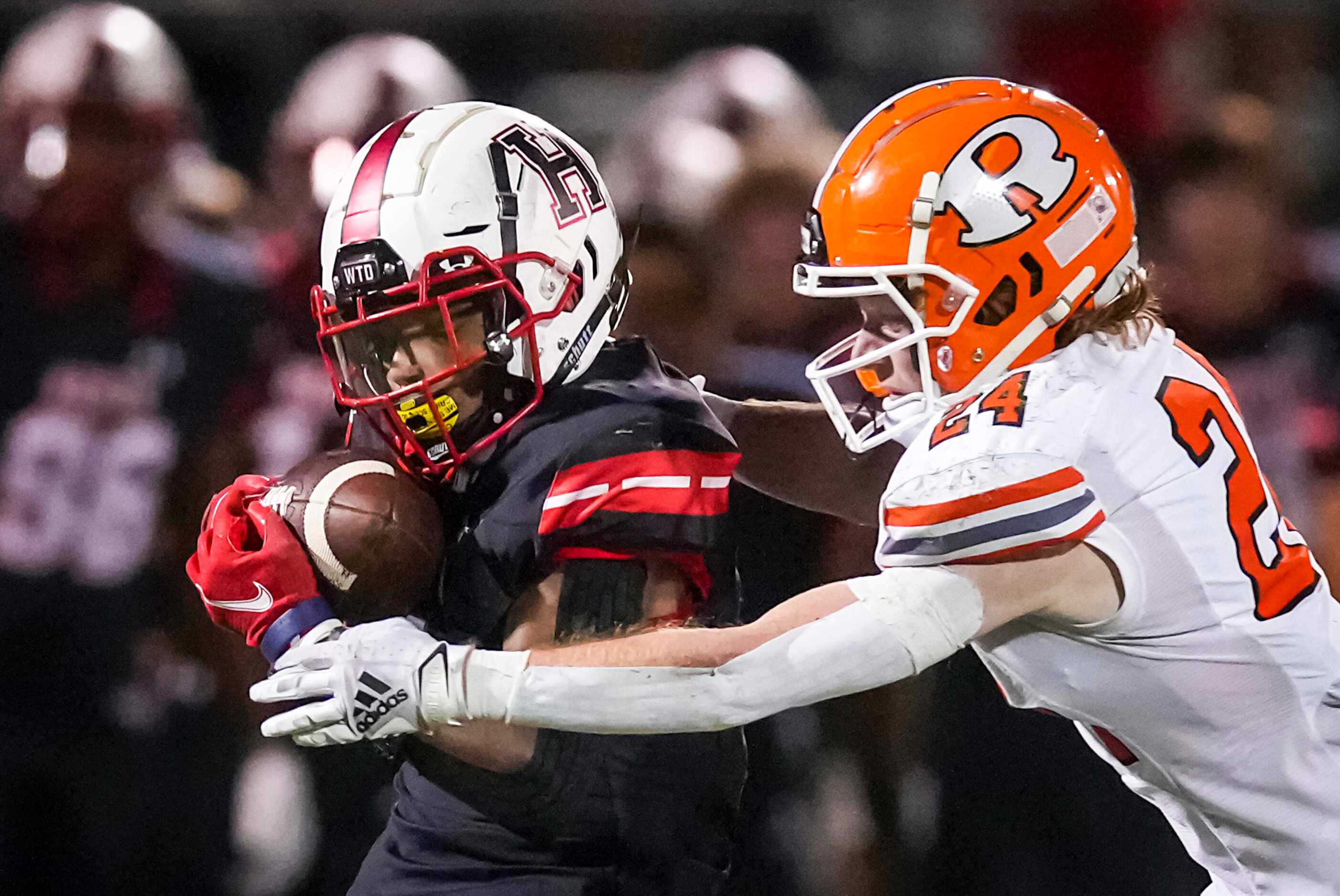 Rockwall-Heath wide receiver Jay Fair (1) hauls in a 69-yard touchdown reception as Rockwall...