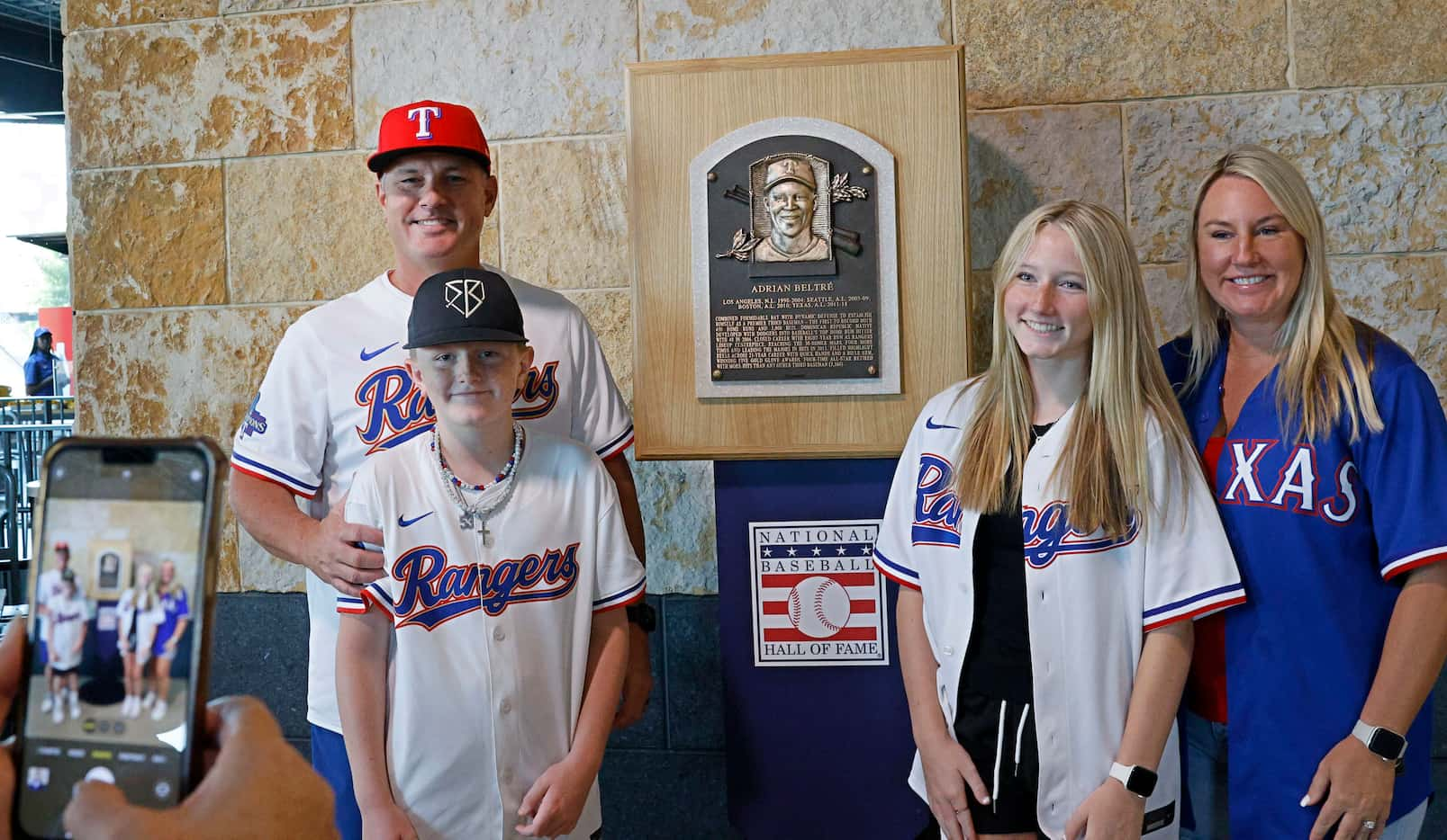 Jarrod Goodman of Argyle, Texas, left, his children Jayce Goodman, 11, and Georgia Goodman, ...