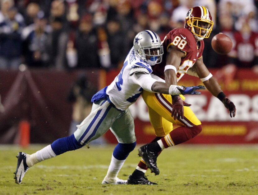 Dallas Cowboys cornerback Morris Claiborne (24) provides tight coverage as a ball is passed...