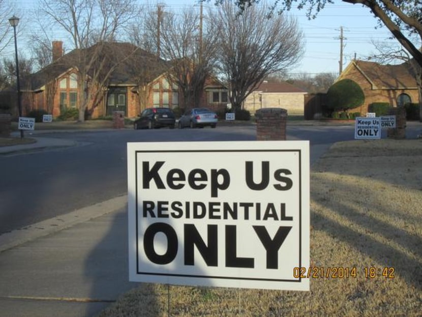 
Neighbors of Congregation Toras Chaim have taken to putting up signs in their front lawns....