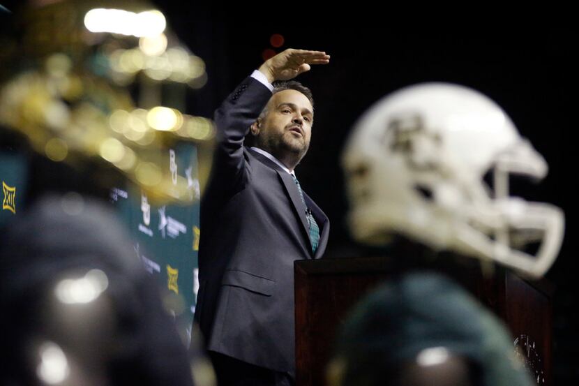 After being introduced, Baylor University's new head football coach Matt Rhule speaks to the...