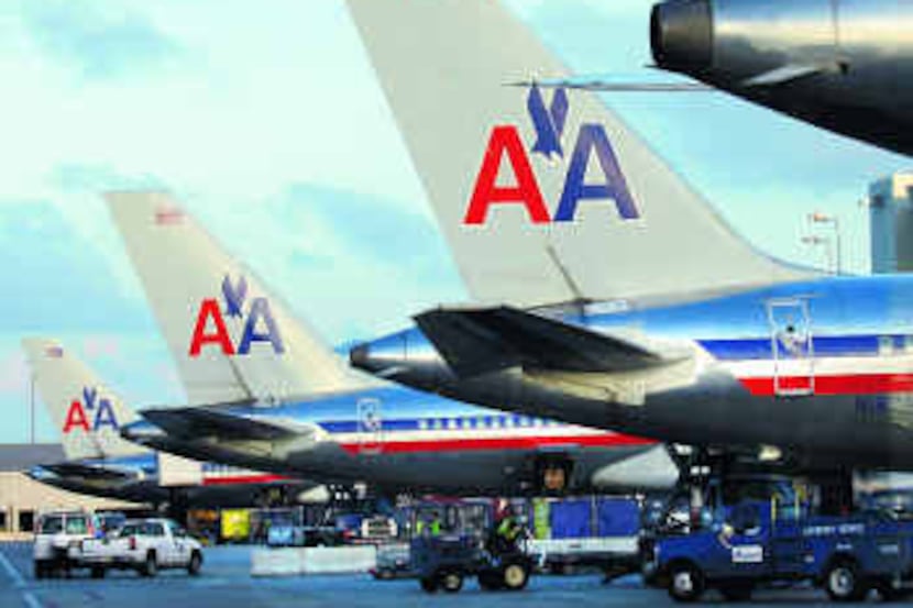 Fort Worth-based American Airlines said its traffic edged higher by 0.4 percent on a 2.7...