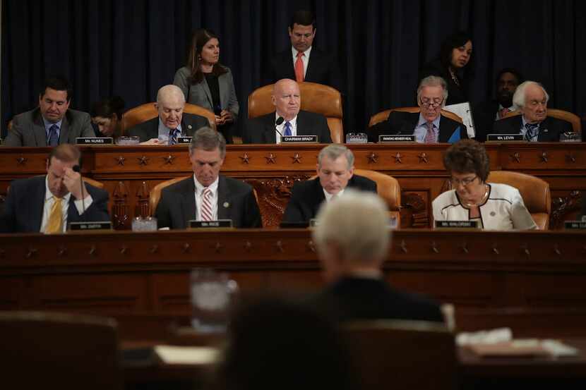 Members of the House Ways and Means Committee, including Chairman Kevin Brady (R-TX) (C),...