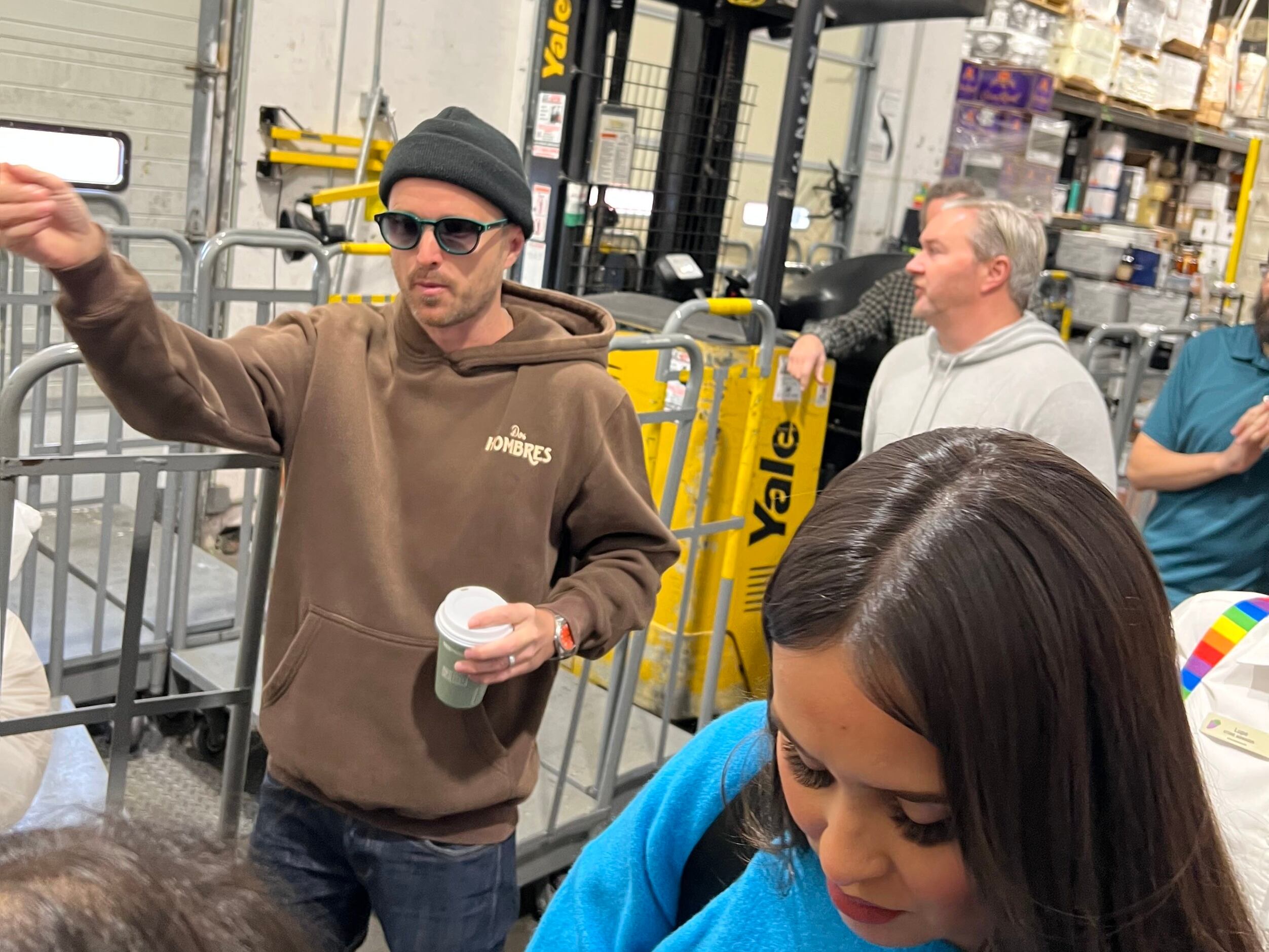 Actor Aaron Paul exits after signing and selling bottles of their mezcal at Total Wine in...
